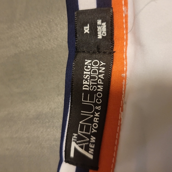 Multi color stripped knee length skirt with buttons on the inside and a string. - Picture 4 of 4